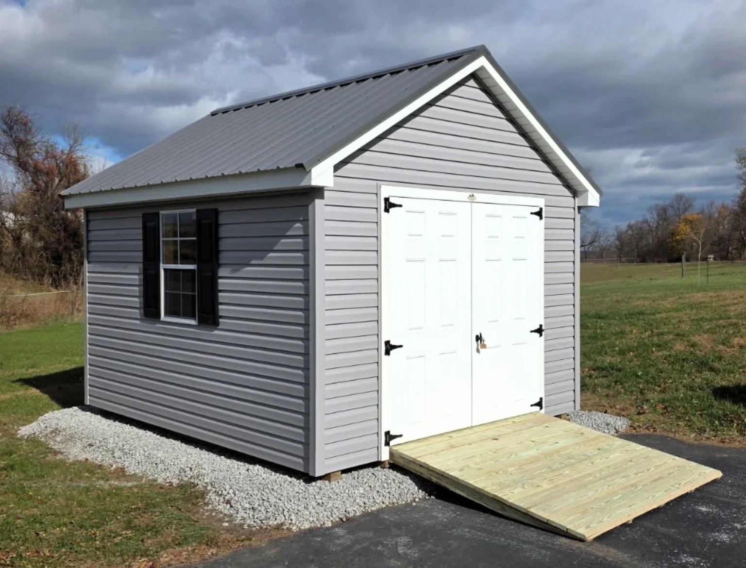 Vinyl shed with ramp